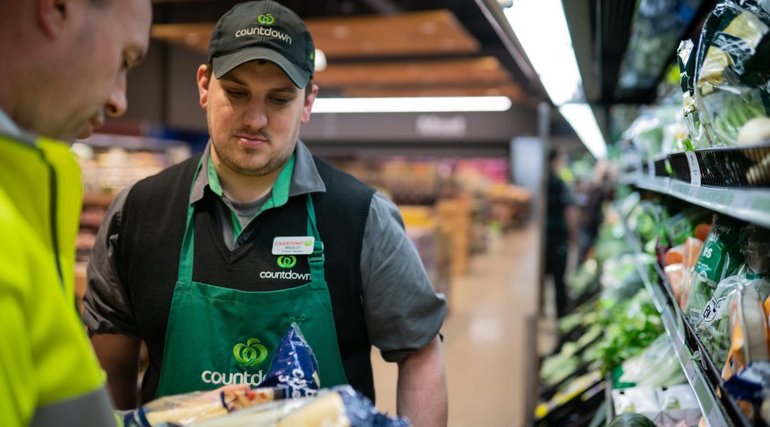 Countdown retail produce manager reviewing fresh vegetables, showing supermarket partnership with So Sweet